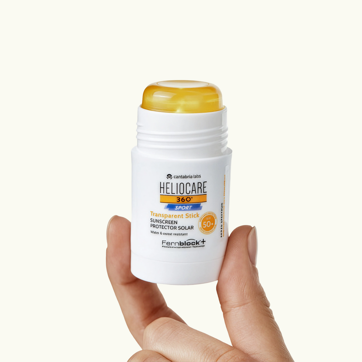 Heliocare 360° Sport Transparent Stick SPF 50+ in hand